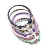 PACK de 5 pulseras pastel con cruz redonda